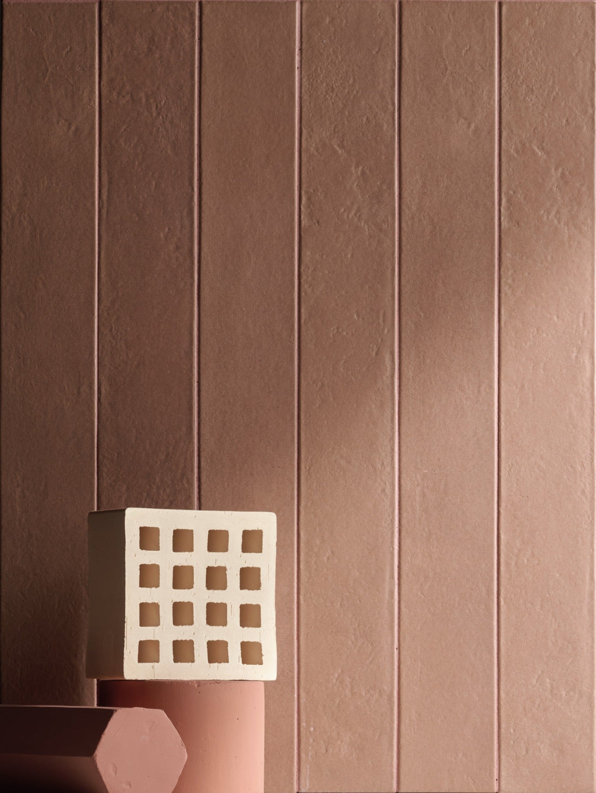 Claywash collection elongated clay-look tiles in a warm blush interior
