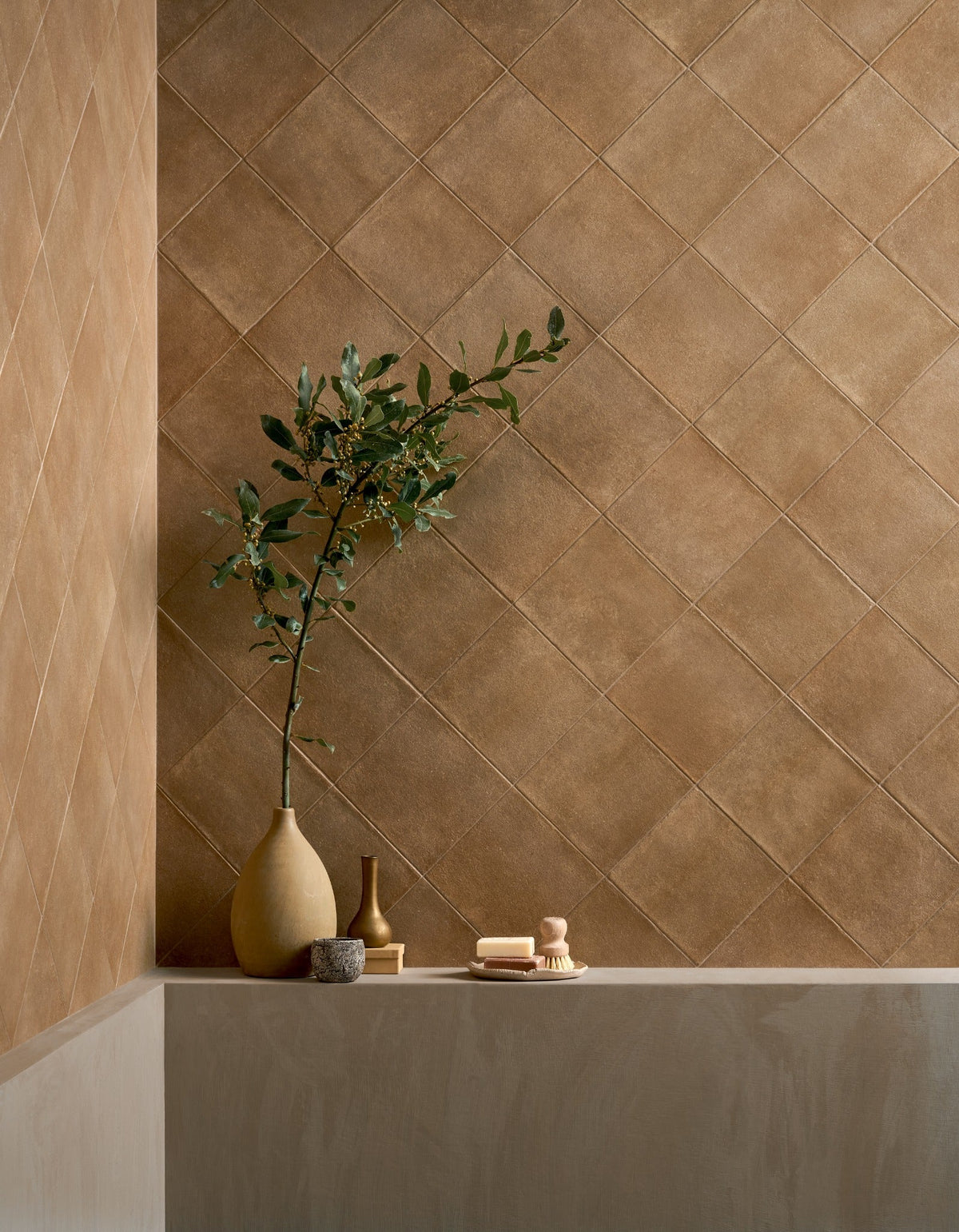 Craft collection terracotta square tiles in a warm, textured bathroom interior