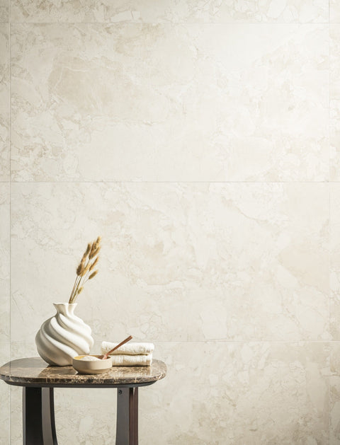 Alice Glow porcelain tiles in a light hotel bathroom