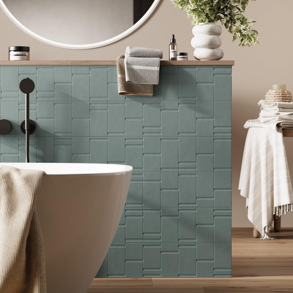 Track Thyme Decor Mix — sage green relief tiles in a bathroom
