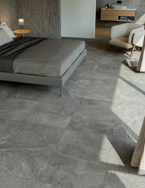 Ardenstone Charcoal porcelain tiles shown in a bedroom floor detail