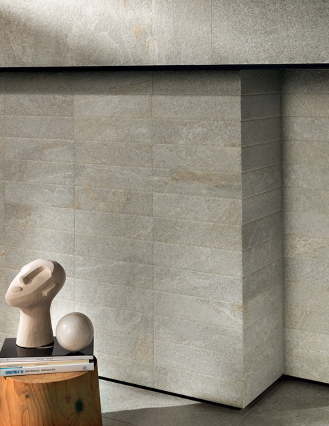 Ardenstone Moonstone porcelain tiles shown in a fireplace detail