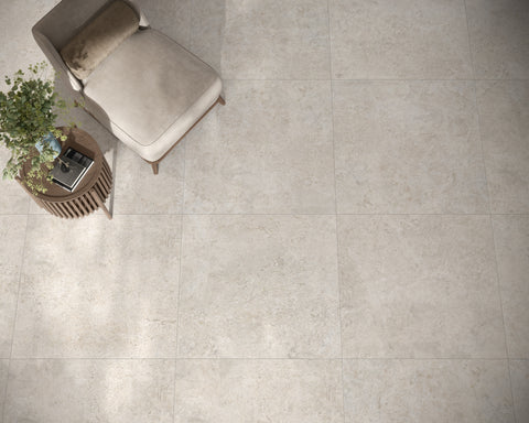 Baverstock Milk limestone-effect porcelain tiles in an overhead interior view