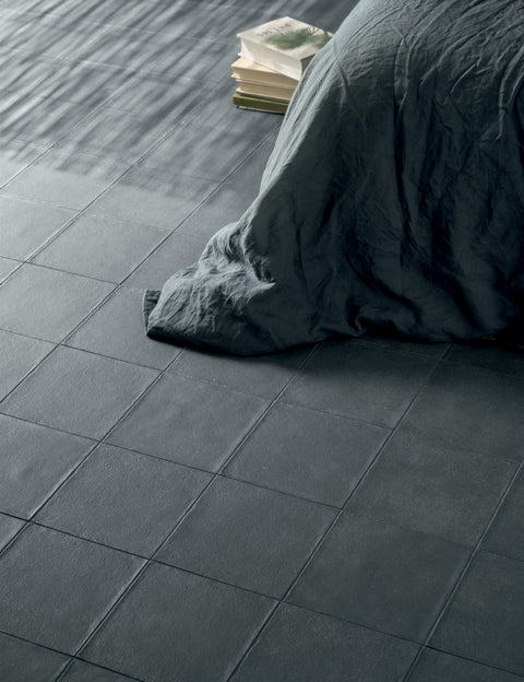 Craft Midnight tiles in a dark bedroom interior